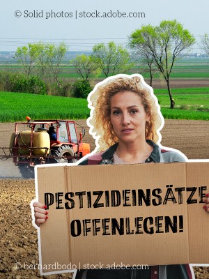 Symbolbild Frau mit Aktionsschild "Pestizideinsätze offenlegen!"